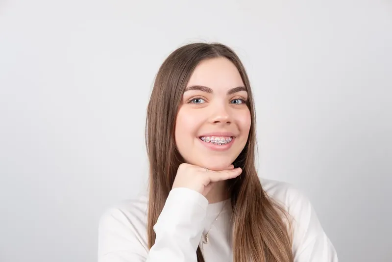 Пациент Orthodontica с родированными брекетами