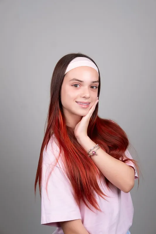 Пациент Orthodontica с сапфировыми брекетами